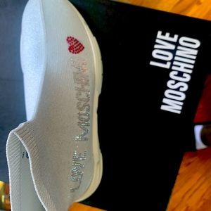 Moschino gym shoes in white/silver. Brand new. Never worn.